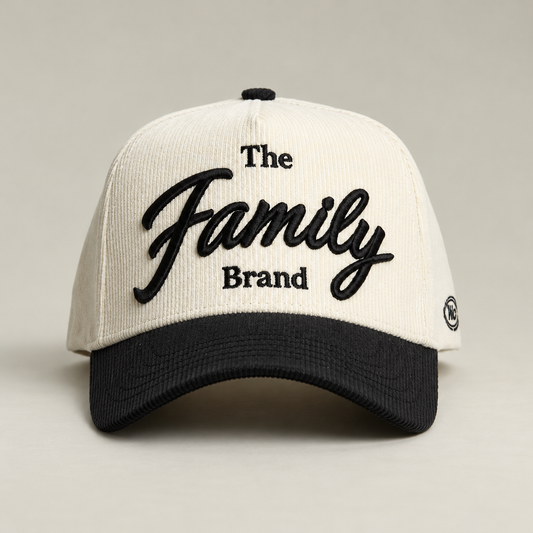 The Family Brand cream corduroy hat with black embroidered logo and curved brim