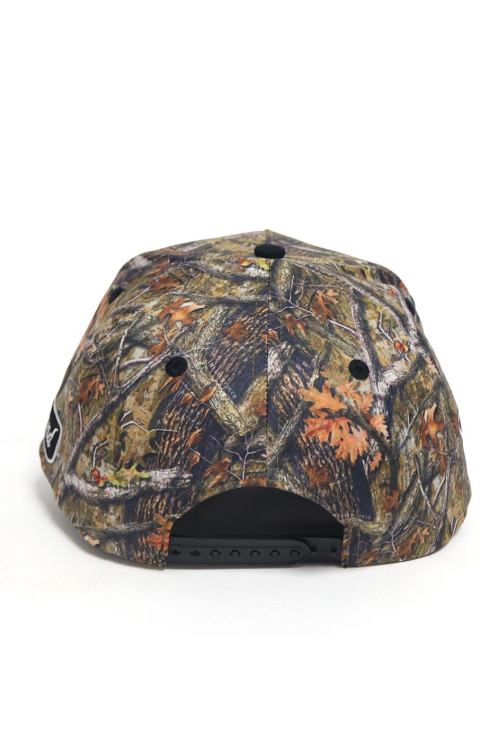 Camouflage-patterned cap on a white background