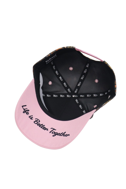 Pink and black cap with 'Life is Better Together' text on a white background