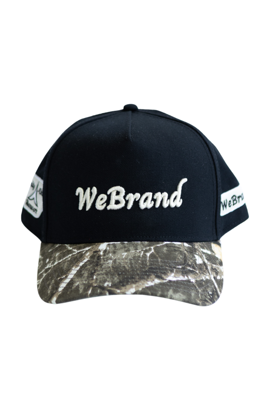 Black cap with camouflage bill and 'WeBrand' logo on a white background