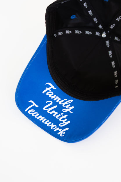Black cap with white text that reads "Family Unity Teamwork" on a blue background