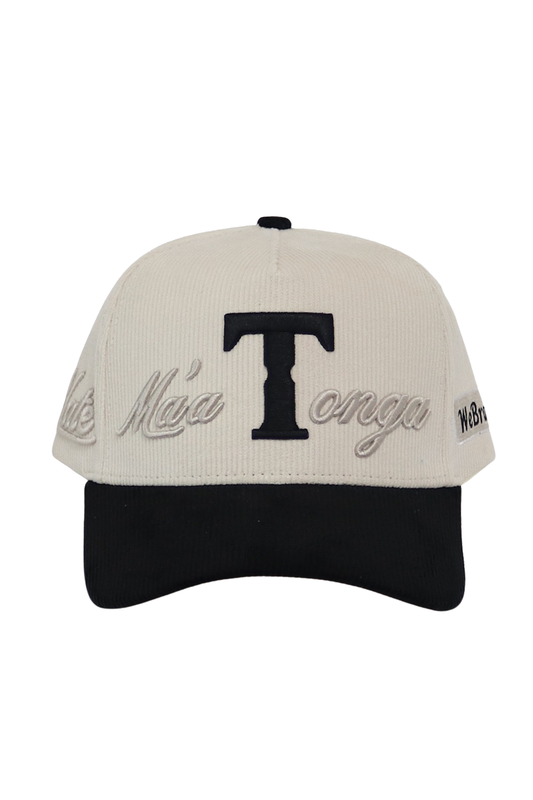 A baseball cap with an off-white crown and a black curved brim. The crown features a large black embroidered letter 'T' in the center, with 'Hale Ma'a Tonga' embroidered in gray script on the sides, and a small 'W88' logo on the side patch.