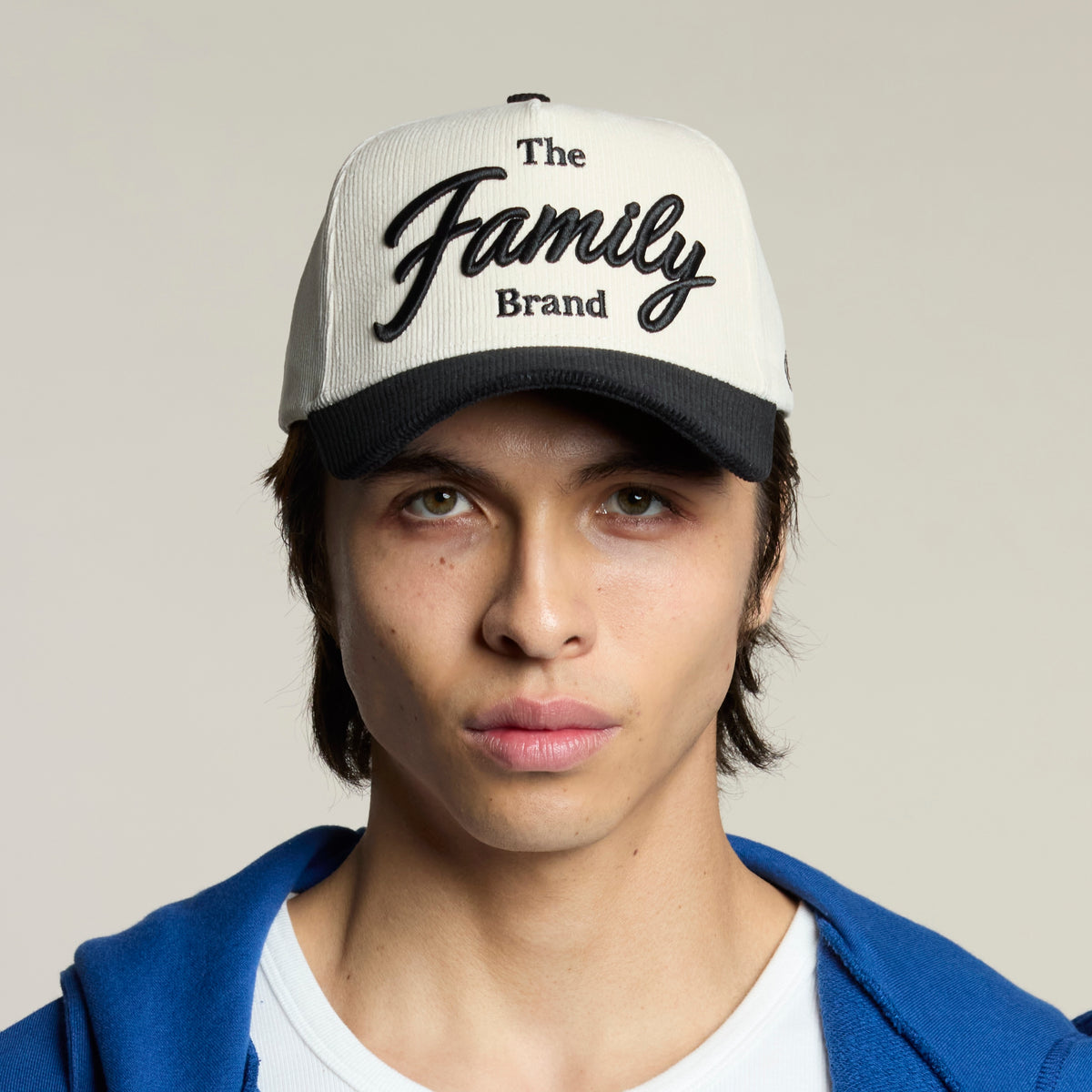 The Family Brand cream corduroy hat on model
