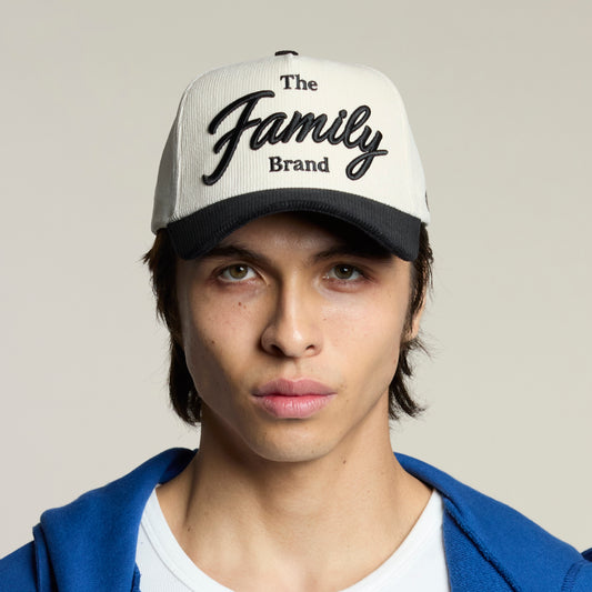 The Family Brand cream corduroy hat on model